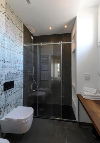 Un baño de B&B The Attico