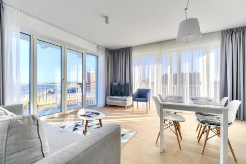 Χώρος καθιστικού στο Apartamenty Marina z widokiem na morze