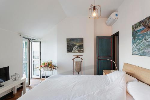 Katil atau katil-katil dalam bilik di Creuza de Ma by Wonderful Italy