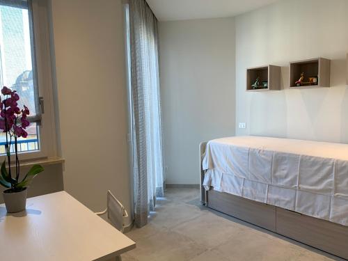 Postel nebo postele na pokoji v ubytování A Casa di Chiara 2