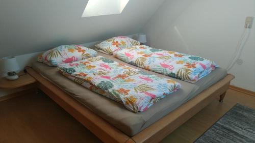 Postel nebo postele na pokoji v ubytování Ostseesonne