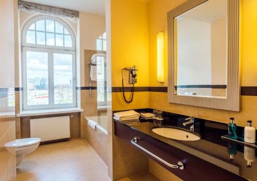  Hotel Polonia Palace -  Room  picture :   Tea/Coffee maker    Safety deposit box    TV                           