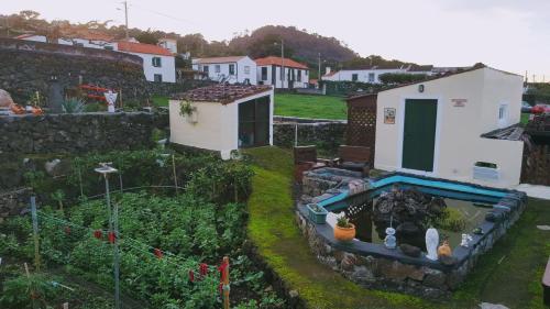 an aerial view of a garden with a house at Quinta do Lago in São Roque do Pico