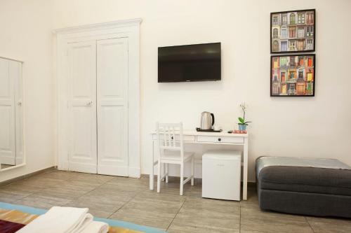 Μια τηλεόραση ή/και κέντρο ψυχαγωγίας στο B&B Martucci Avenue