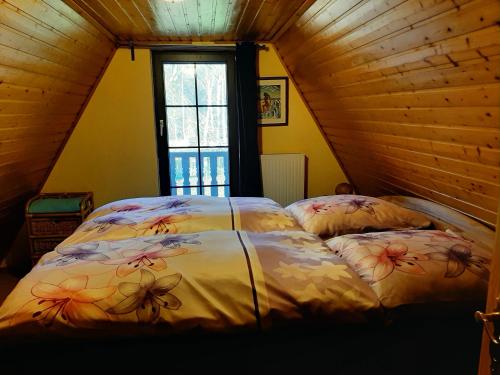 Postel nebo postele na pokoji v ubytování Ferienhaus Kerstin