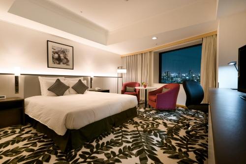 Postel nebo postele na pokoji v ubytování ANA Crowne Plaza Hotel Grand Court Nagoya by IHG