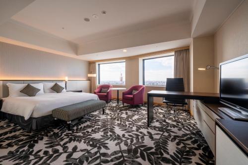 Postel nebo postele na pokoji v ubytování ANA Crowne Plaza Hotel Grand Court Nagoya by IHG
