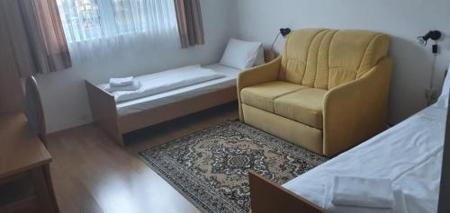 Una cama o camas en una habitación de Gasthof Kasperle