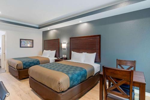 Ένα ή περισσότερα κρεβάτια σε δωμάτιο στο Econo Lodge Houston Northwest - Cypress
