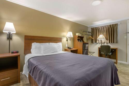 Voodi või voodid majutusasutuse Econo Lodge Bellefonte I-99 toas