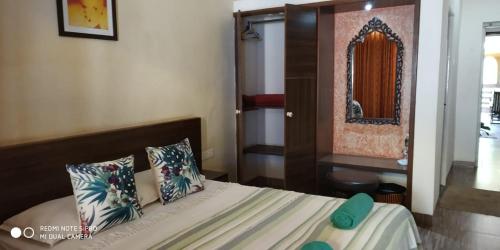 Ένα ή περισσότερα κρεβάτια σε δωμάτιο στο Hotel Bonanza