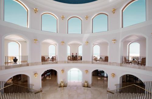 an image of a large building with large windows at Mitsis Selection Laguna in Hersonissos