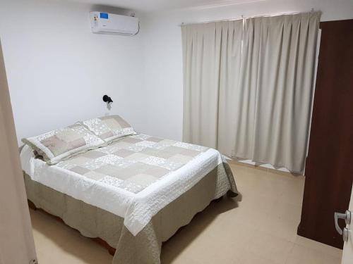 Ένα ή περισσότερα κρεβάτια σε δωμάτιο στο CENTRO RENT APART