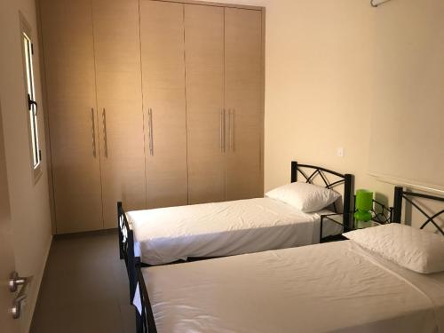 Voodi või voodid majutusasutuse Aphrodite Sands Resort - The Penthouse toas