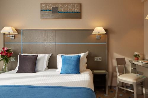 Cama o camas de una habitación en Alizé Grenelle Tour Eiffel
