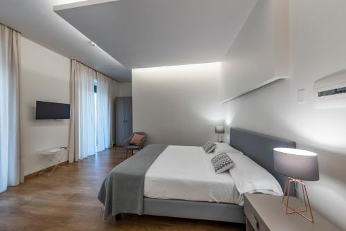 Postel nebo postele na pokoji v ubytování Villa Albina