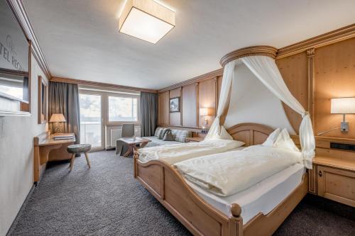 Postel nebo postele na pokoji v ubytování Hotel Regina