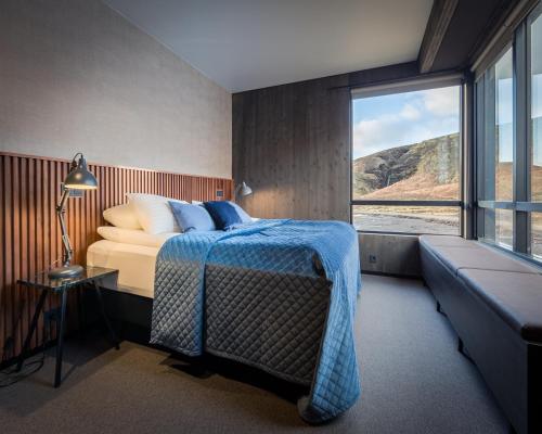 Tempat tidur dalam kamar di Fosshotel Glacier Lagoon