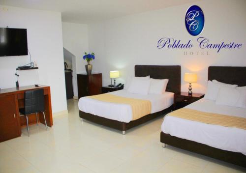 Кровать или кровати в номере Hotel Poblado Campestre