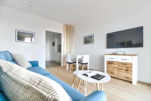 Μια τηλεόραση ή/και κέντρο ψυχαγωγίας στο Apartamenty Marina z widokiem na morze
