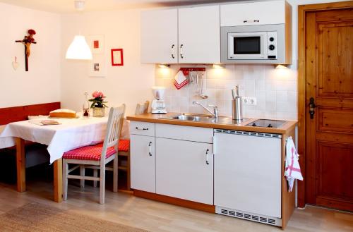 Kuchyň nebo kuchyňský kout v ubytování Haus Wienertoni