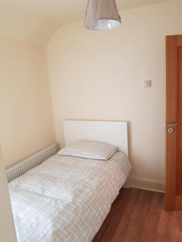 Llit o llits en una habitació de Edith Grove House