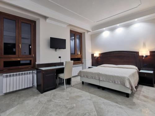 Postel nebo postele na pokoji v ubytování Hotel Valentino Palace