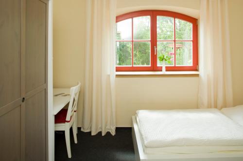 Postel nebo postele na pokoji v ubytování Kulturgasthof Alte Reederei