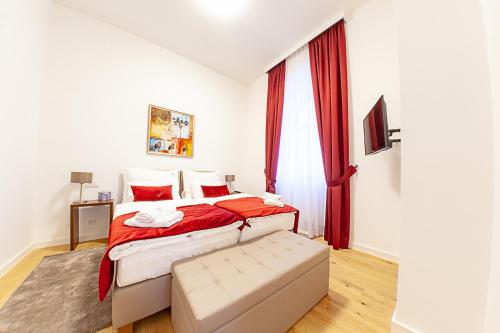 Postel nebo postele na pokoji v ubytování Gold Residence