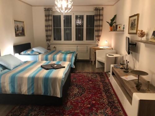 מיטה או מיטות בחדר ב-Auszeit; Gästehaus & mehr
