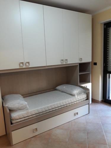 Ένα ή περισσότερα κρεβάτια σε δωμάτιο στο lady casa