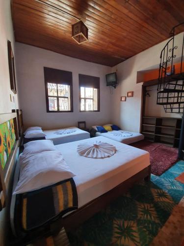 Postel nebo postele na pokoji v ubytování Hotel Liquidambar