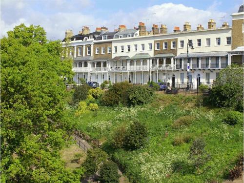 a row of large white buildings in a city at Hamiltons Boutique Hotel in Southend-on-Sea