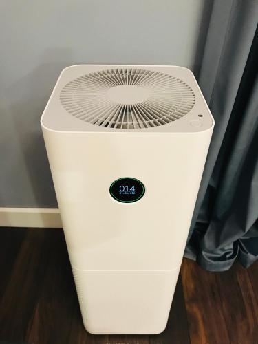 a white air cooler sitting on the floor at VNVP Apartment in Štip