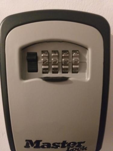 a close up of a microwave oven with its buttons at Luxury Daniel Apartament Residence Militari in Roşu