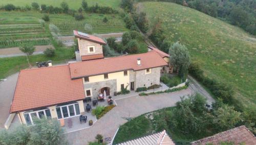 an aerial view of a house with a red roof at Poggio d'Incanto in Bettola