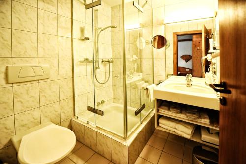 Ванная комната в Country Wellnesshotel Bündnerhof