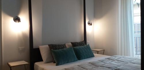 Ένα ή περισσότερα κρεβάτια σε δωμάτιο στο Il Rosone Luxury B&B