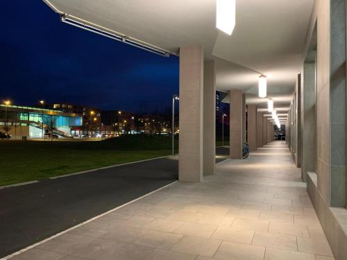 an empty hallway of a building at night at Central & Elegant Room in Biel in Biel