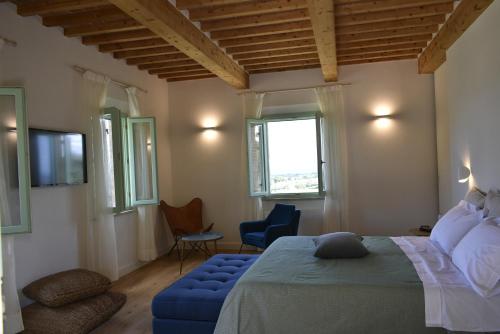 Ένα ή περισσότερα κρεβάτια σε δωμάτιο στο Villa Cicolina