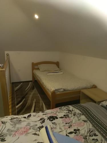 Llit o llits en una habitació de apartment jankovic