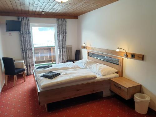 Postel nebo postele na pokoji v ubytování Landgasthof Hotel Zehenthof