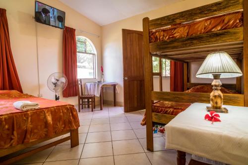 מיטה או מיטות בחדר ב-Go-Inn Hotel