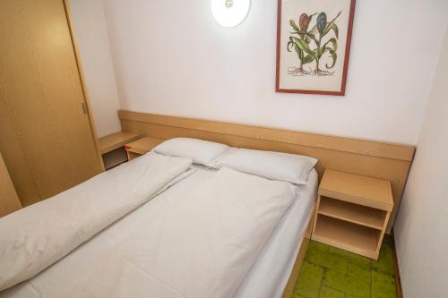 Letto o letti in una camera di Alaska Clubresidence
