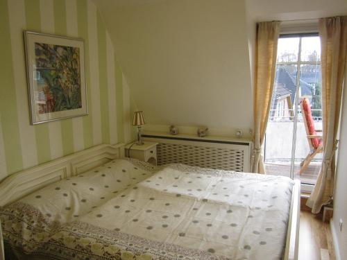 Postel nebo postele na pokoji v ubytování Residenz Weedkroog