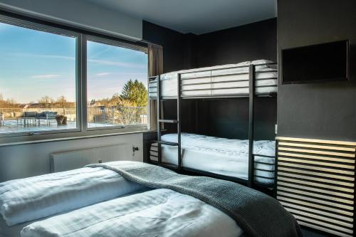 Postel nebo postele na pokoji v ubytování Hotel-B