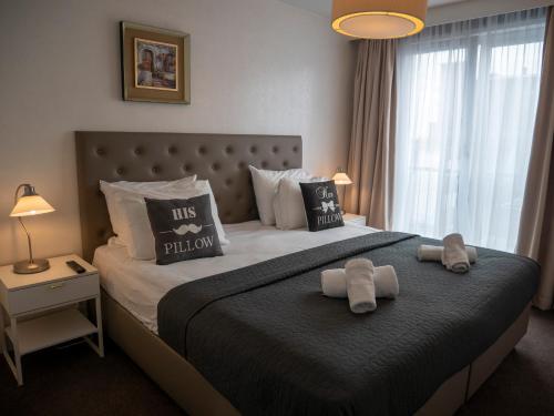 Tempat tidur dalam kamar di Hotel Hague Center