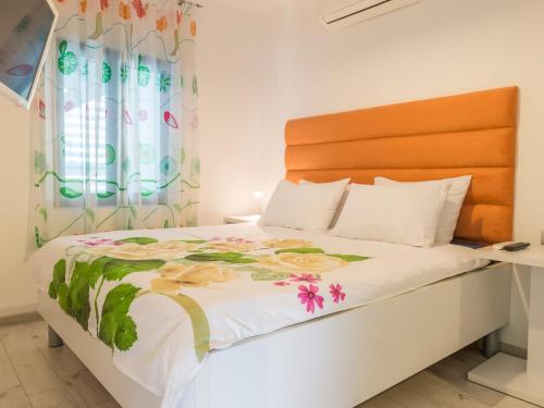 Postel nebo postele na pokoji v ubytování Apartments Windrose
