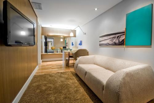 Télévision ou salle de divertissement dans l'établissement Hotel Gran Marquise