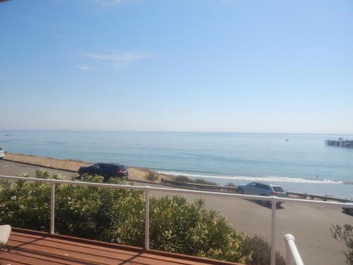 a view of the ocean from the balcony of a condo at 196 Front Street in Avila Beach